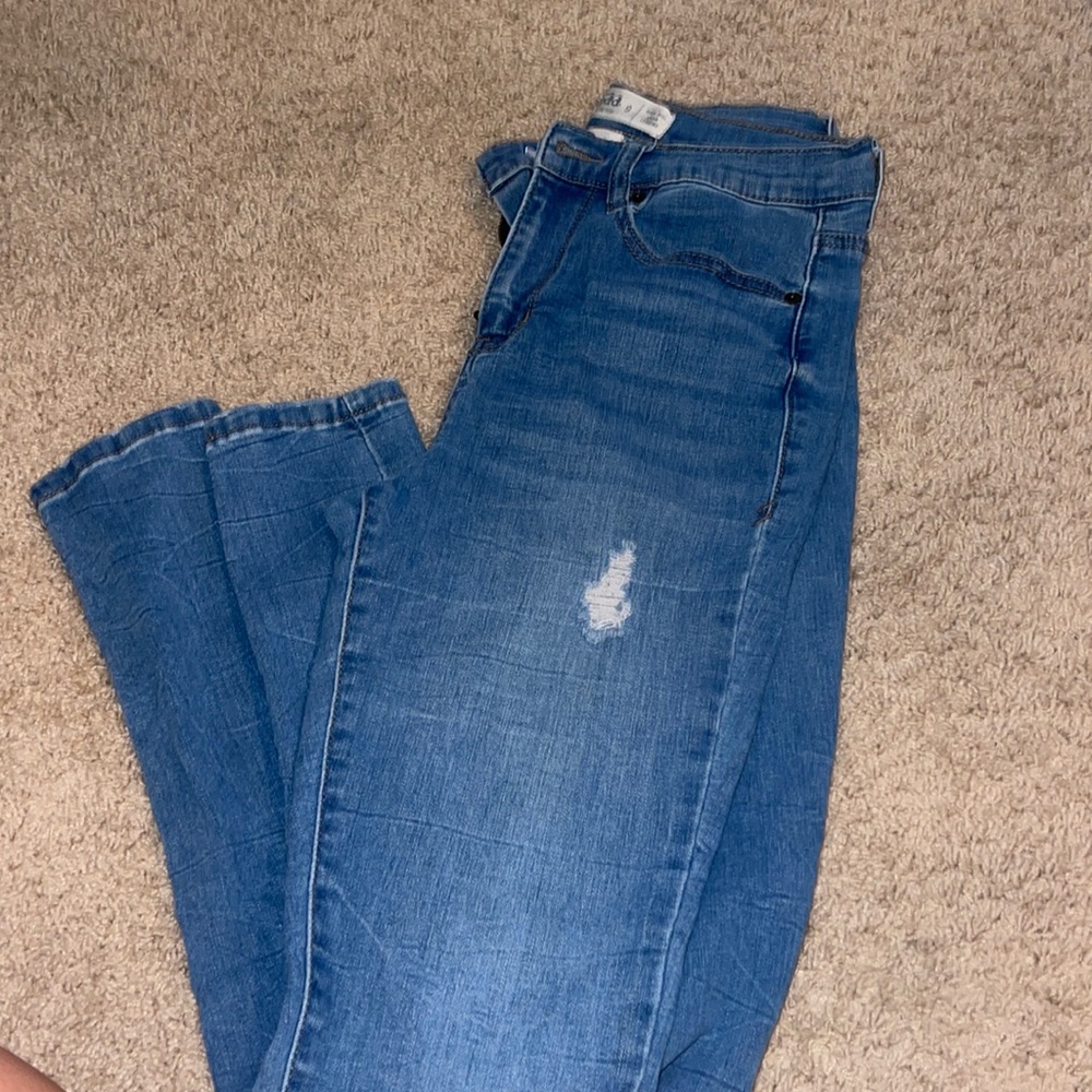 Jeans with slight non see through holes